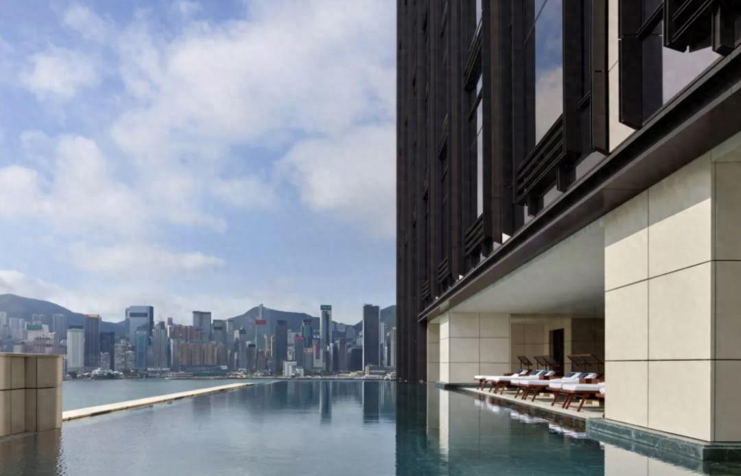 瑰丽酒店集团出售_郑裕彤家族资产处置_新世界发展公告